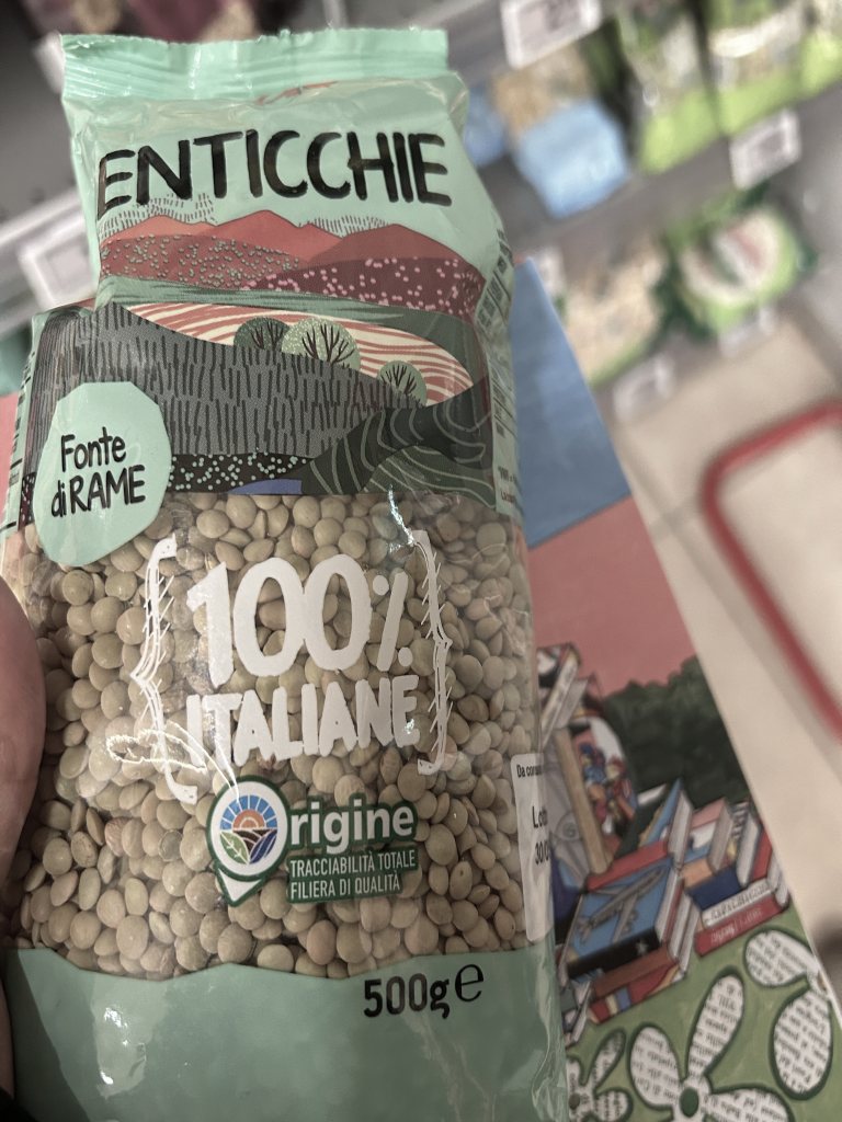 Bulk bags of lentils at a market