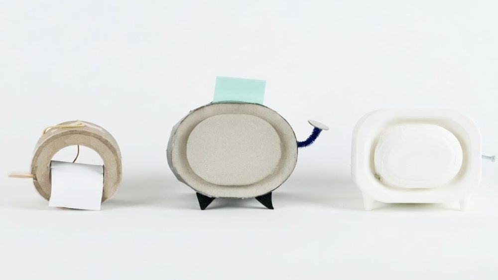 Early form factor prototypes in cardboard, wood and white plastic